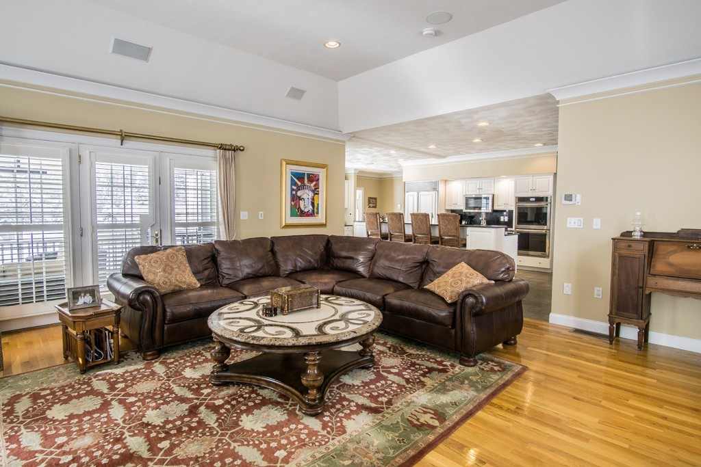 16 Somerset Drive Andover, MA 01810 - Photo 11 of 30 a living room with furniture a wooden floor and next to a window