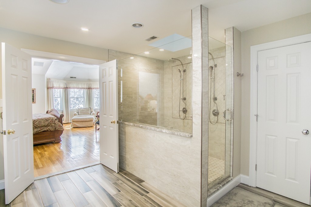 16 Somerset Drive Andover, MA 01810 - Photo 17 of 30 a view of a bathroom with tub and shower