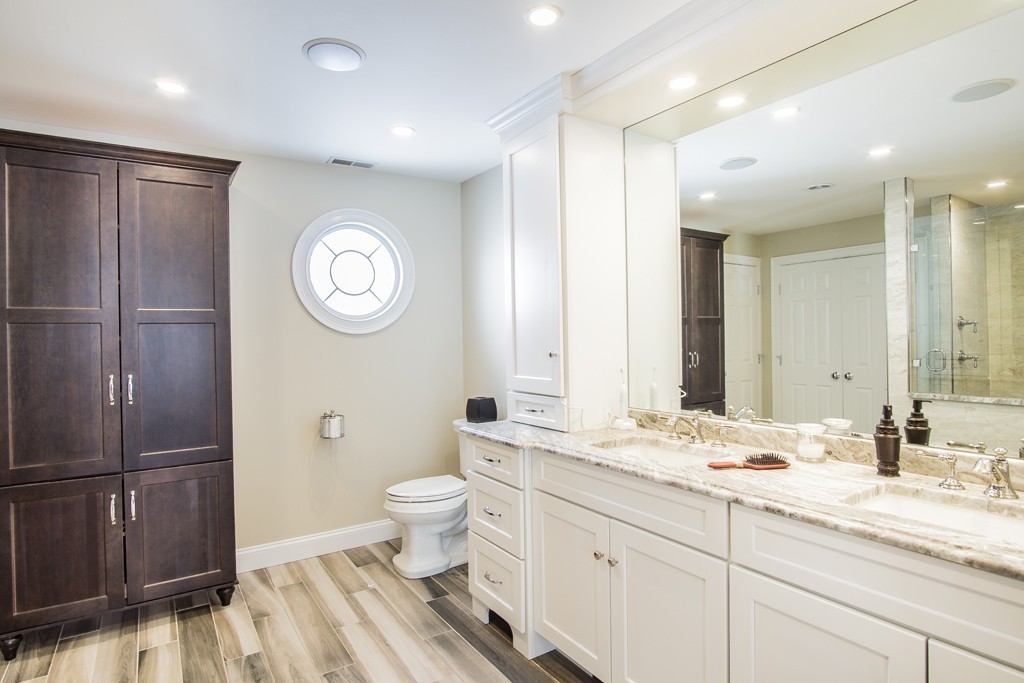 16 Somerset Drive Andover, MA 01810 - Photo 21 of 30 a bathroom with a toilet a sink and mirror