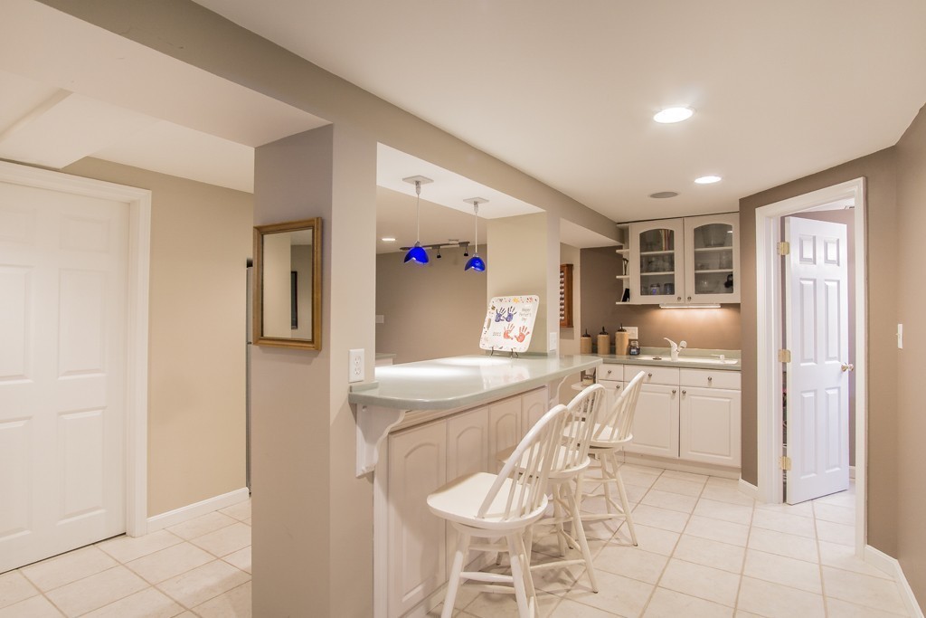 16 Somerset Drive Andover, MA 01810 - Photo 24 of 30 a dining hall with stainless steel appliances furniture a window and a kitchen view