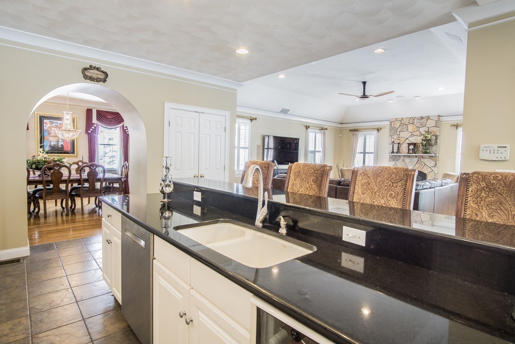 16 Somerset Drive Andover, MA 01810 - Photo 6 of 30 a spacious bathroom with a granite countertop sink a mirror and bathtub