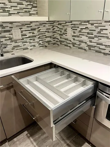 a bathroom with a toilet and shower