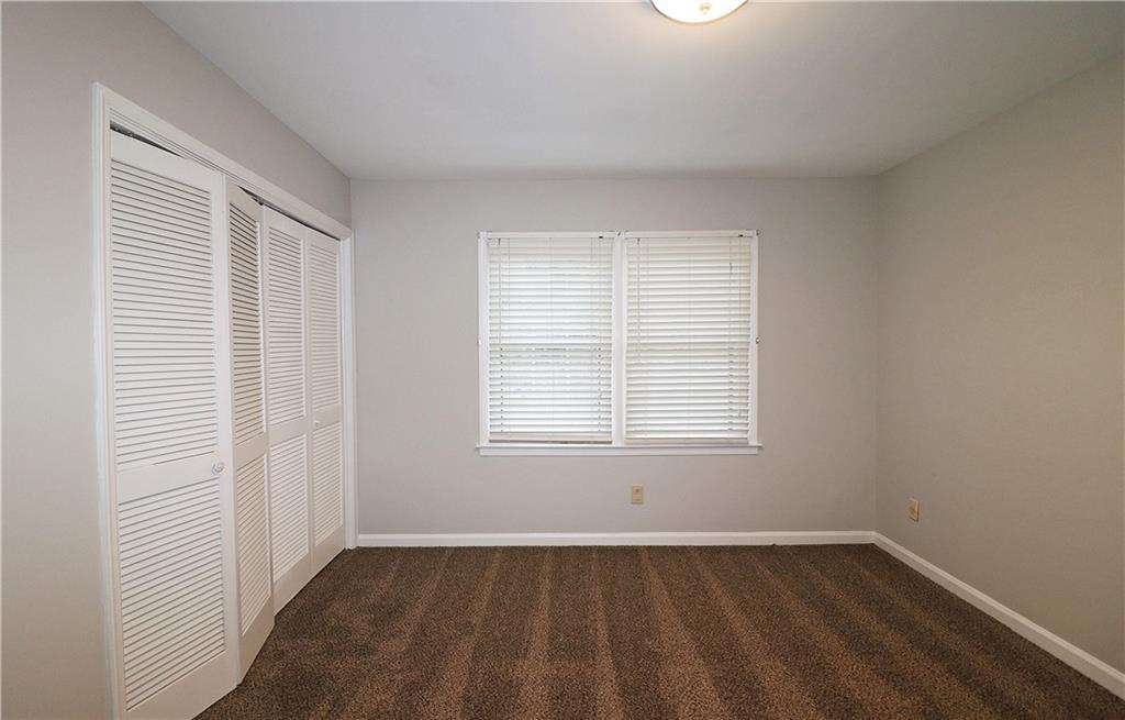 40 Glenald Way Northwest Atlanta, GA 30327 - Photo 32 of 35 an empty room with a window