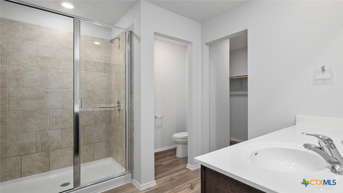2317 Saffron Road Temple, TX 76501 - Photo 16 of 22 a bathroom with a bathtub and a sink