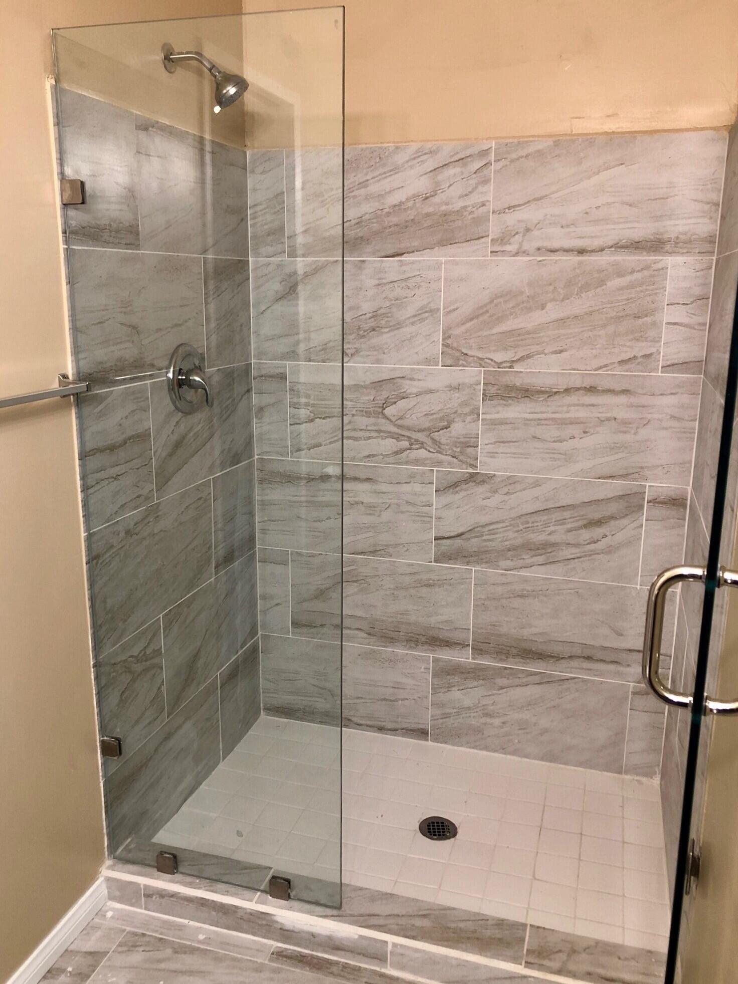 81104 Francis Avenue Indio, CA 92201 - Photo 13 of 23 a bathroom with a shower