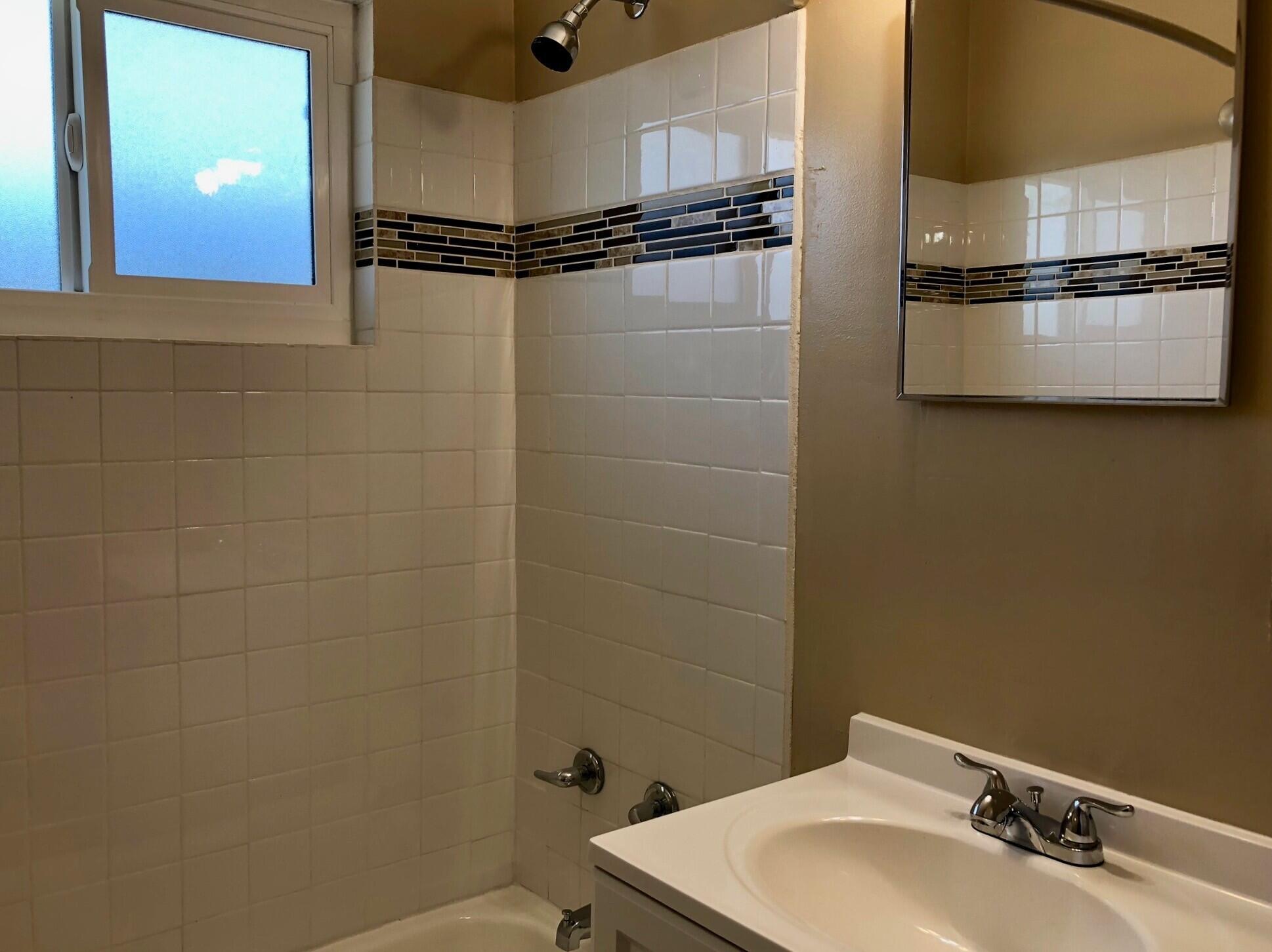 81104 Francis Avenue Indio, CA 92201 - Photo 18 of 23 a bathroom with a sink and mirror