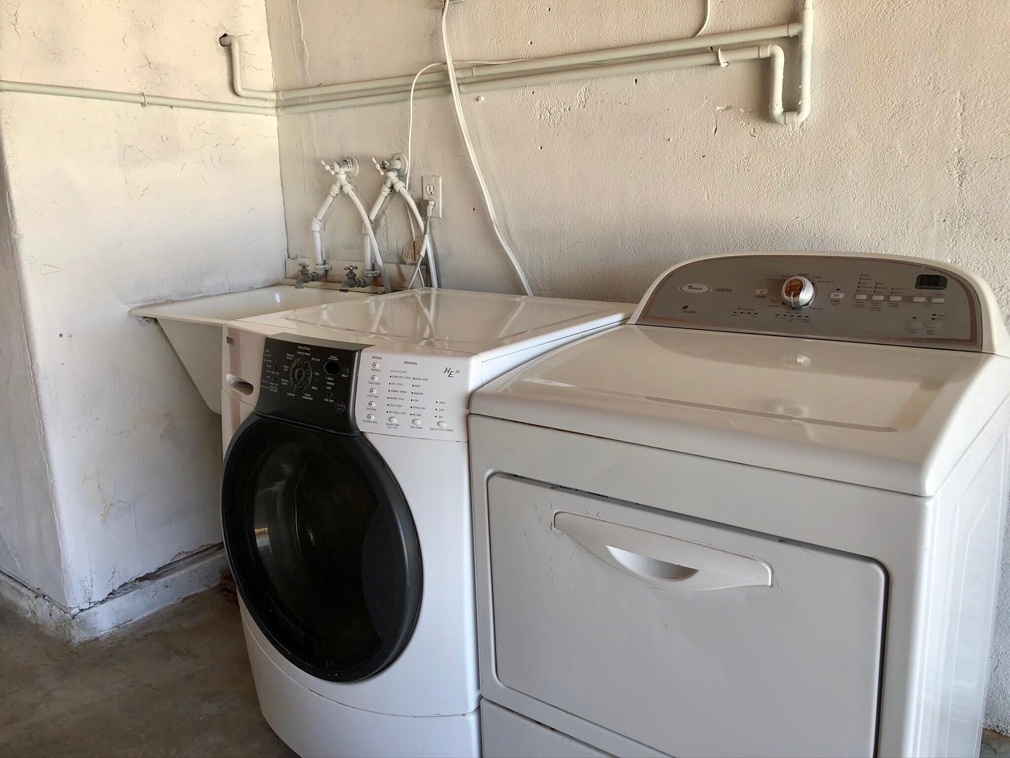 81104 Francis Avenue Indio, CA 92201 - Photo 20 of 23 a utility room with dryer and washer