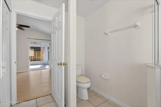 a bathroom with a granite countertop mirror