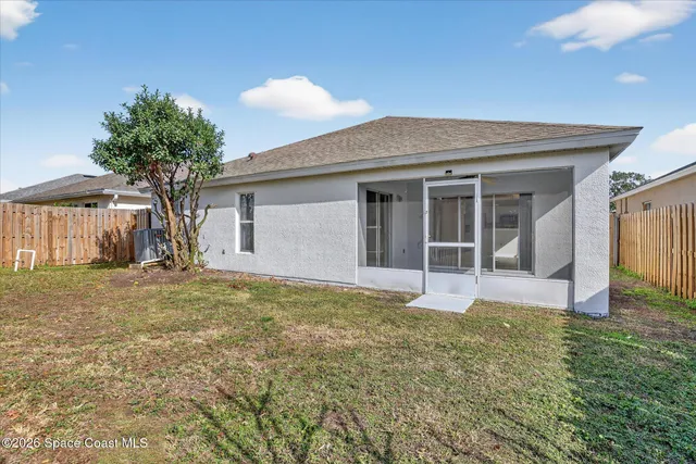 a house view with a garden space