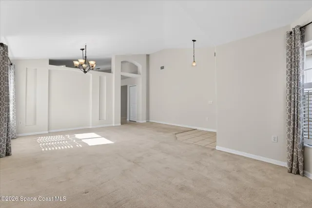 a view of a room with a chandelier