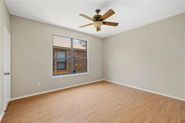 a bathroom with a bath tub with a shower