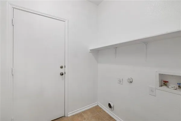 a view of a room with racks on the wall