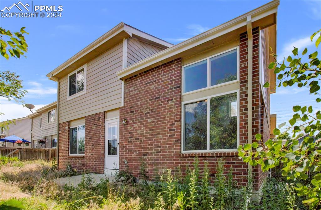 4176 South Himalaya Way Aurora, CO 80013 - Photo 27 of 27 View of side of property
