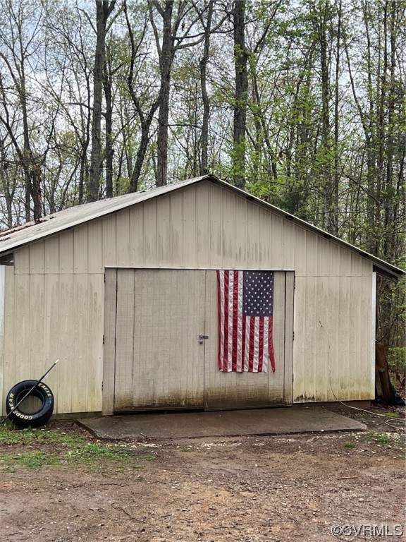 1092 Saunders Lane Meherrin, VA 23954 - Photo 18 of 19 a couple of potted plants sitting in front of a door