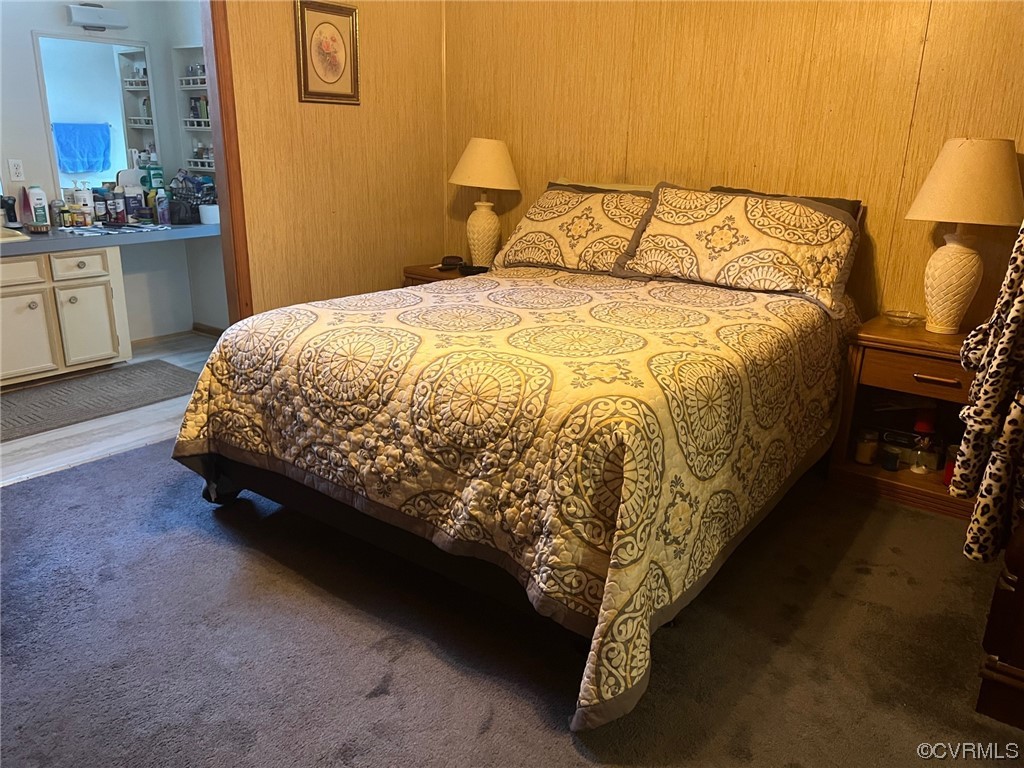 1092 Saunders Lane Meherrin, VA 23954 - Photo 9 of 19 a bed sitting in a bathroom next to a sink