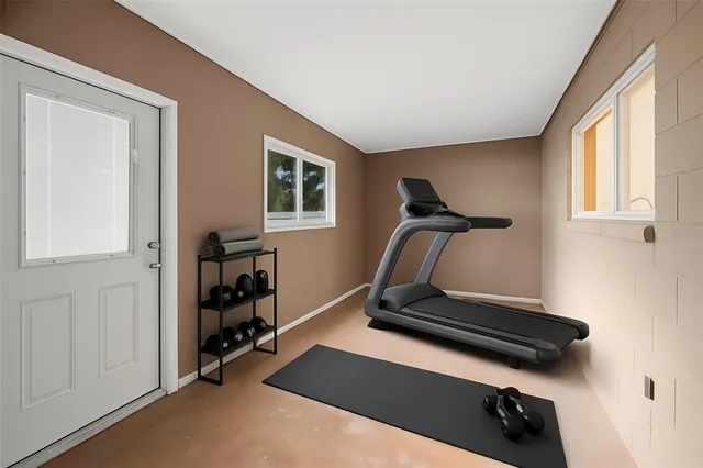 an aerial view of lake and residential houses with outdoor space and lake view