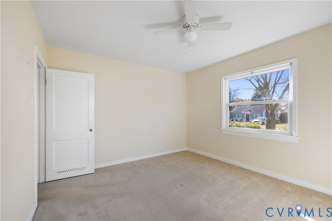 3423 Reynolds Road Richmond, VA 23223 - Photo 15 of 26 a view of an empty room with a window