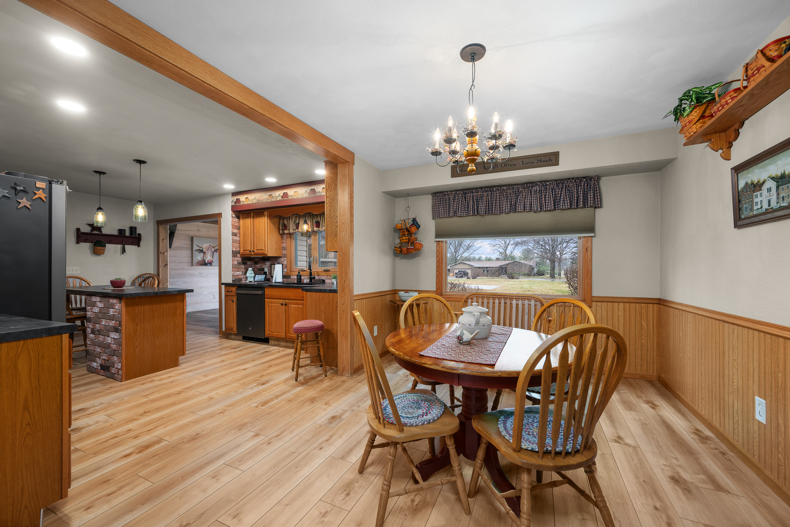 10 Pine Tree Court Kewanee, IL 61443 - Photo 13 of 39 a view of a dining room with furniture and a chandelier
