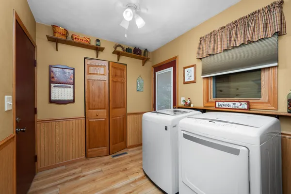a utility room with dryer and washer