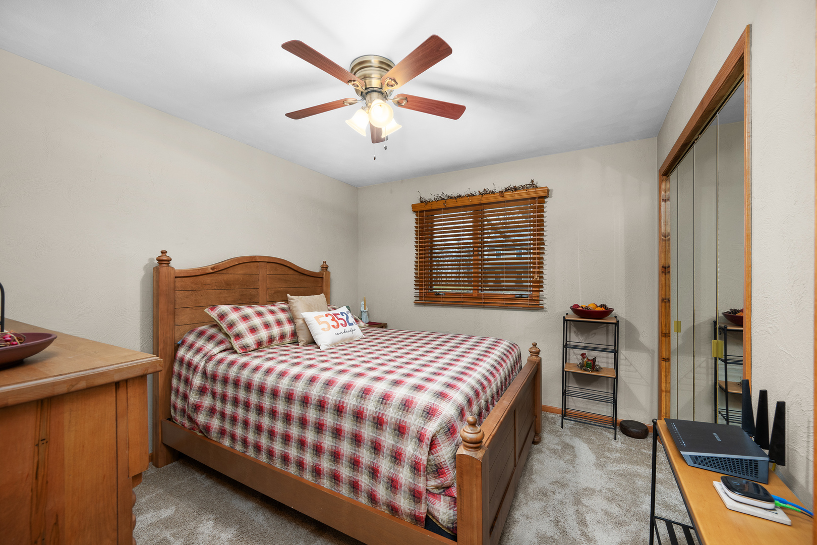 10 Pine Tree Court Kewanee, IL 61443 - Photo 25 of 39 a bedroom with a bed and a flat screen tv