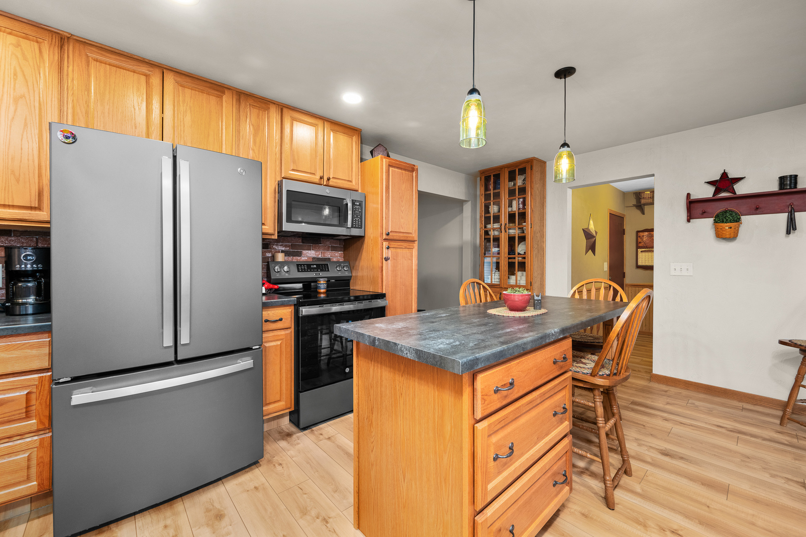 10 Pine Tree Court Kewanee, IL 61443 - Photo 8 of 39 a kitchen with stainless steel appliances granite countertop a refrigerator a stove top oven a sink and a refrigerator