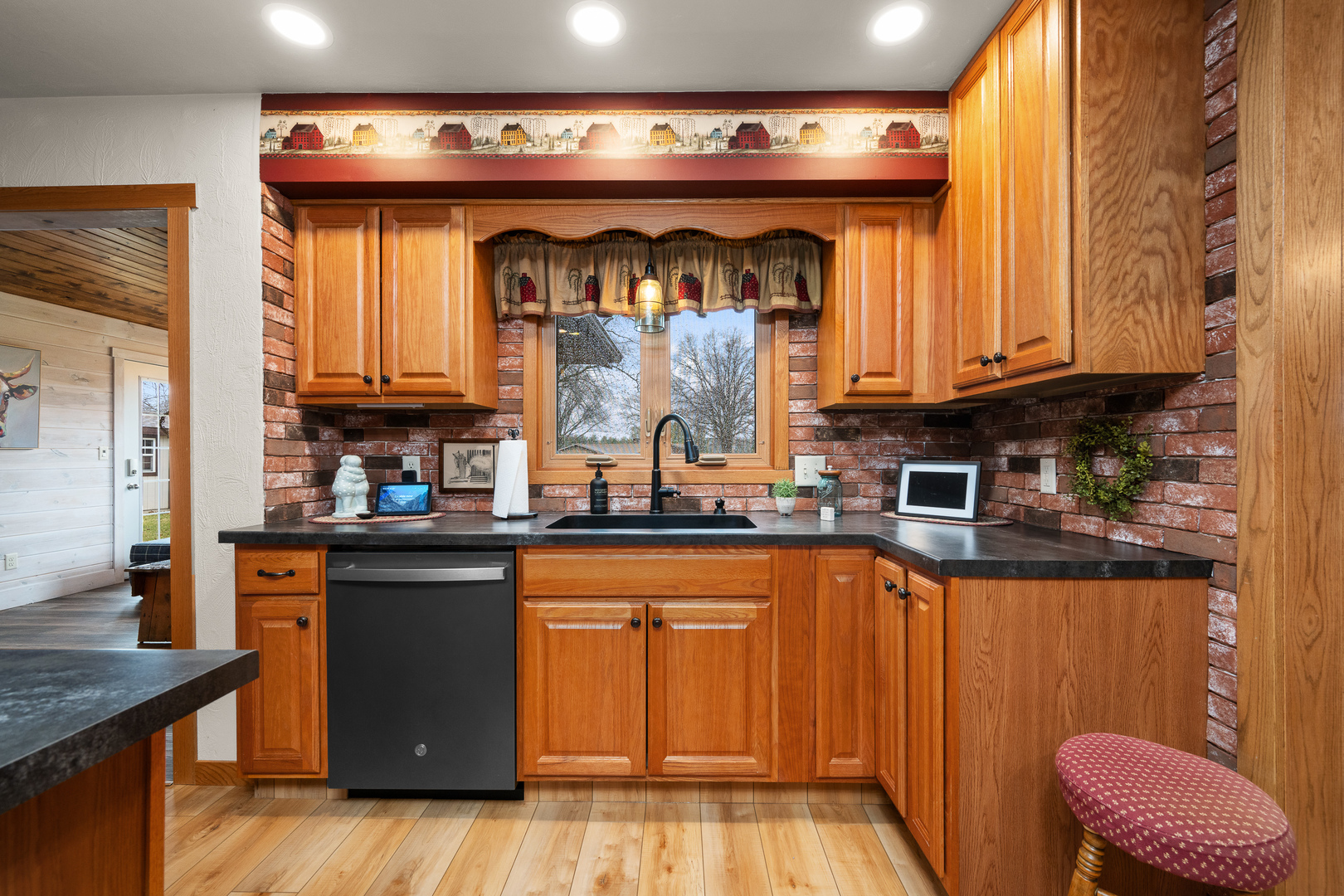 10 Pine Tree Court Kewanee, IL 61443 - Photo 9 of 39 a kitchen with stainless steel appliances granite countertop a stove and a sink
