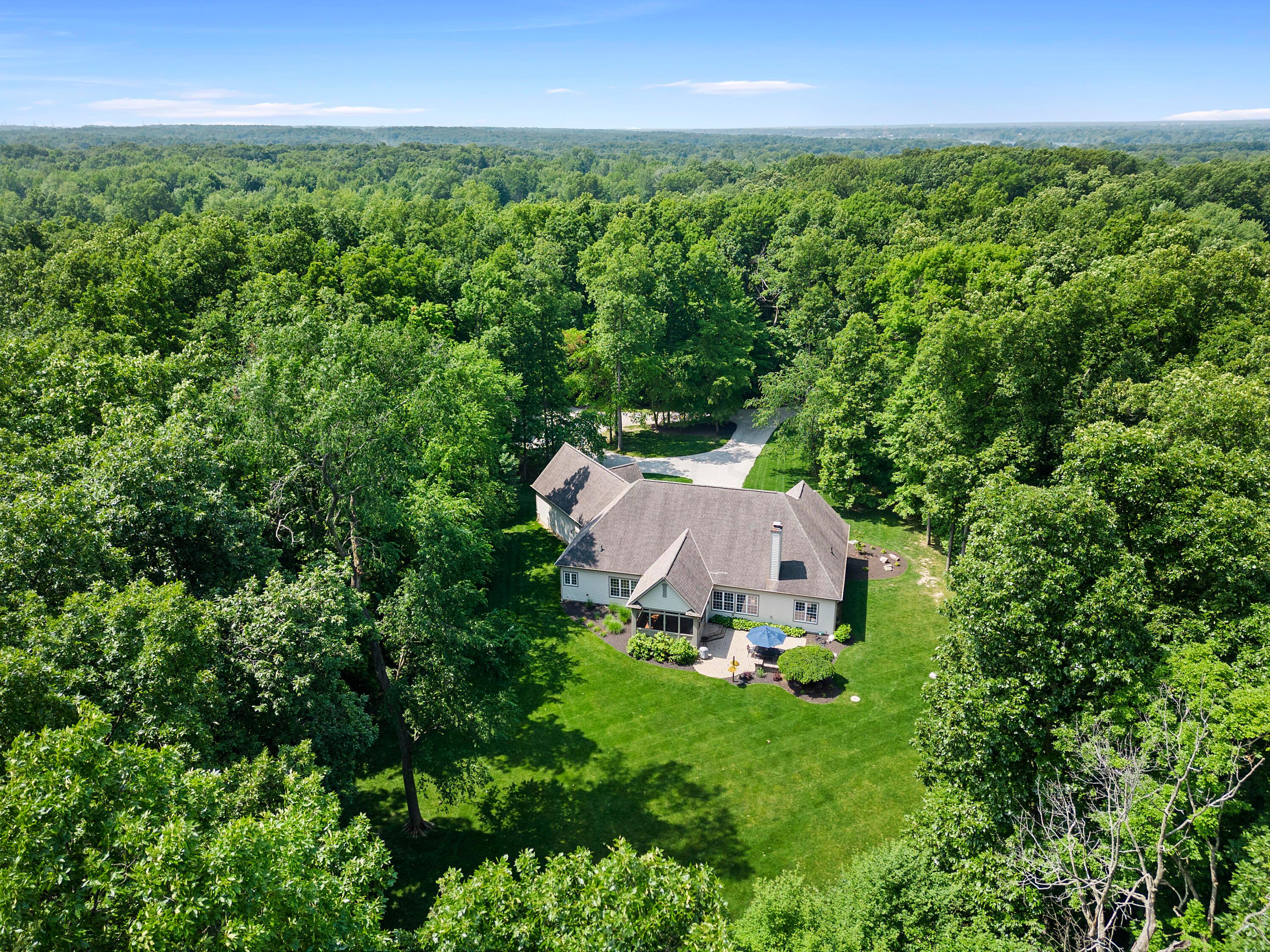 5761 Hughes Road Galena, OH 43021 - Photo 2 of 43 Custom Amish-built residence nestled on over 5 acres of wooded property;