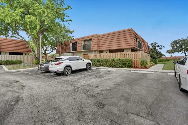 a car parked in front of a house