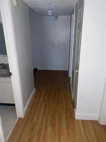 a view of a house with a small yard