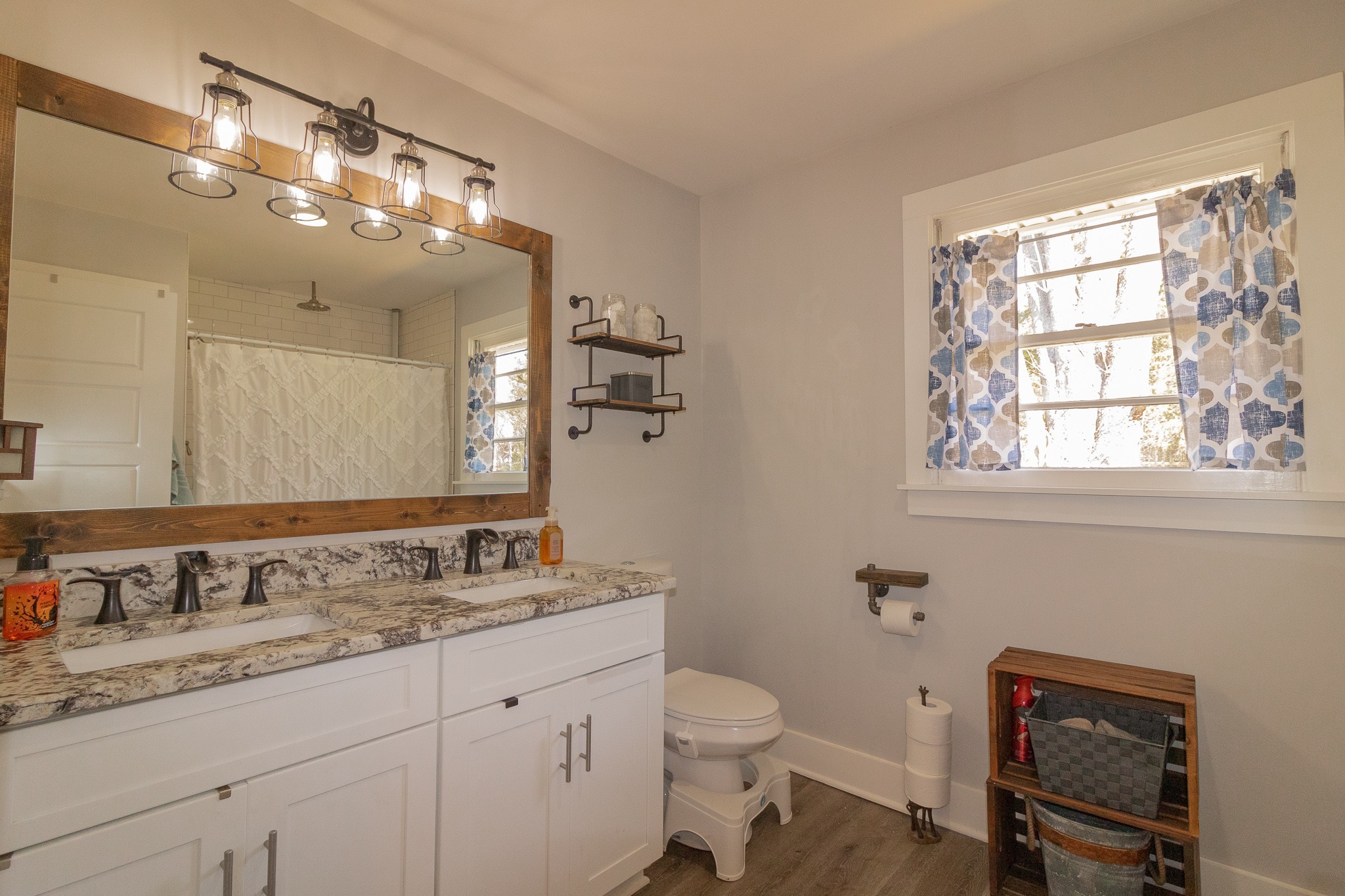 555 Lindsley Road Lebanon, TN 37090 - Photo 12 of 31 a bathroom with a granite countertop sink a toilet and a mirror