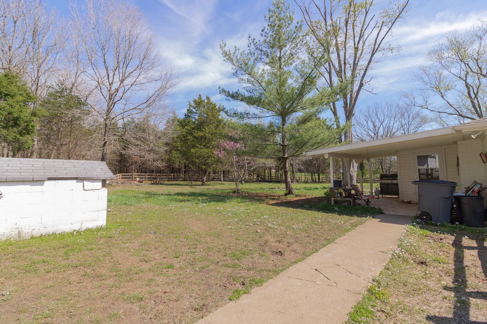 555 Lindsley Road Lebanon, TN 37090 - Photo 30 of 31 a view of a house with backyard and sitting area