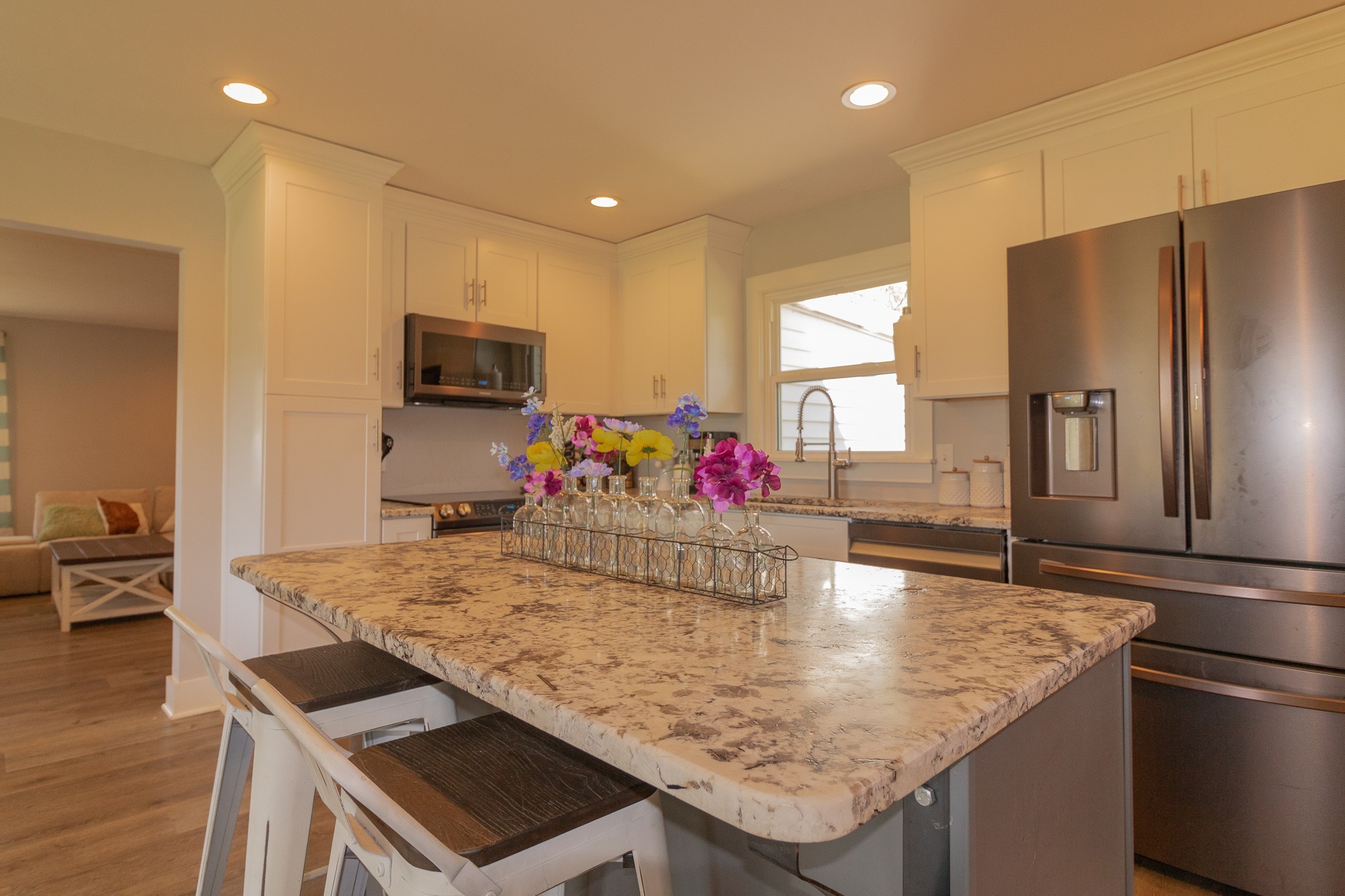 555 Lindsley Road Lebanon, TN 37090 - Photo 6 of 31 a kitchen with stainless steel appliances granite countertop a sink refrigerator and microwave