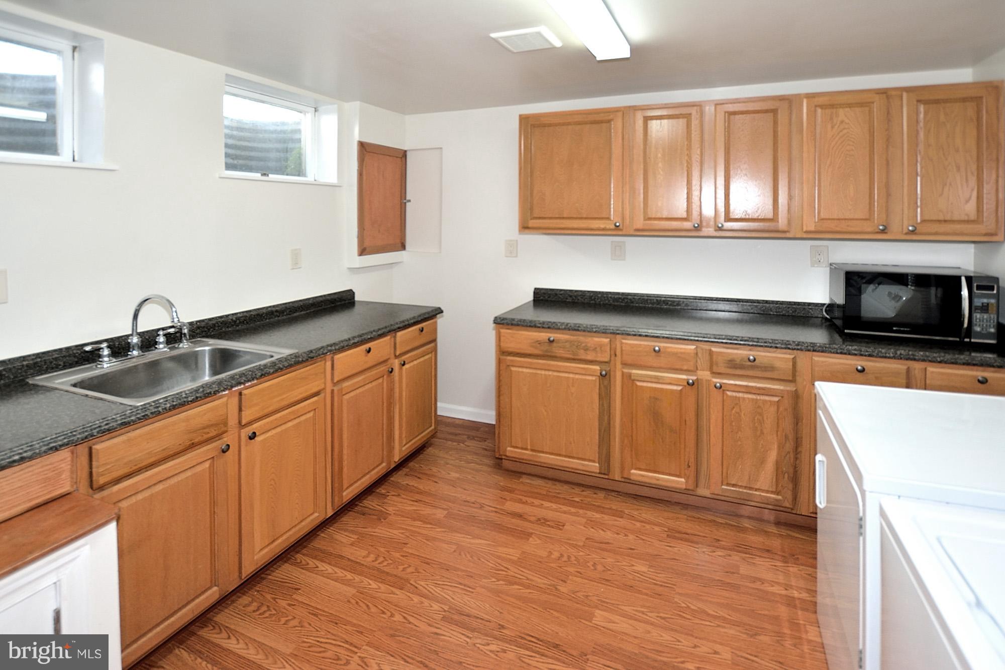 13928 Riding Loop Drive North Potomac, MD 20878 - Photo 22 of 29 Kitchenette in basement.