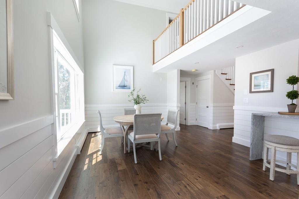3 Kalmia Way Barnstable, MA 02632 - Photo 11 of 26 a view of a dining room with furniture and wooden floor