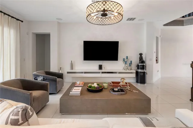 a kitchen with stainless steel appliances kitchen island granite countertop a sink and cabinets