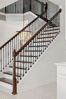 a large kitchen with lots of counter space and sink