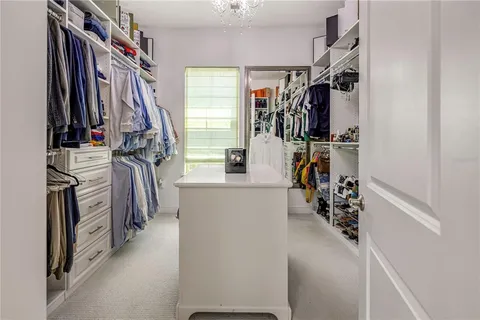 a view of swimming pool with outdoor seating