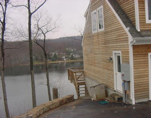 24 Waters Edge Way Ridgefield, CT 06877 - Photo 1 of 1 a view of a brick house with a door