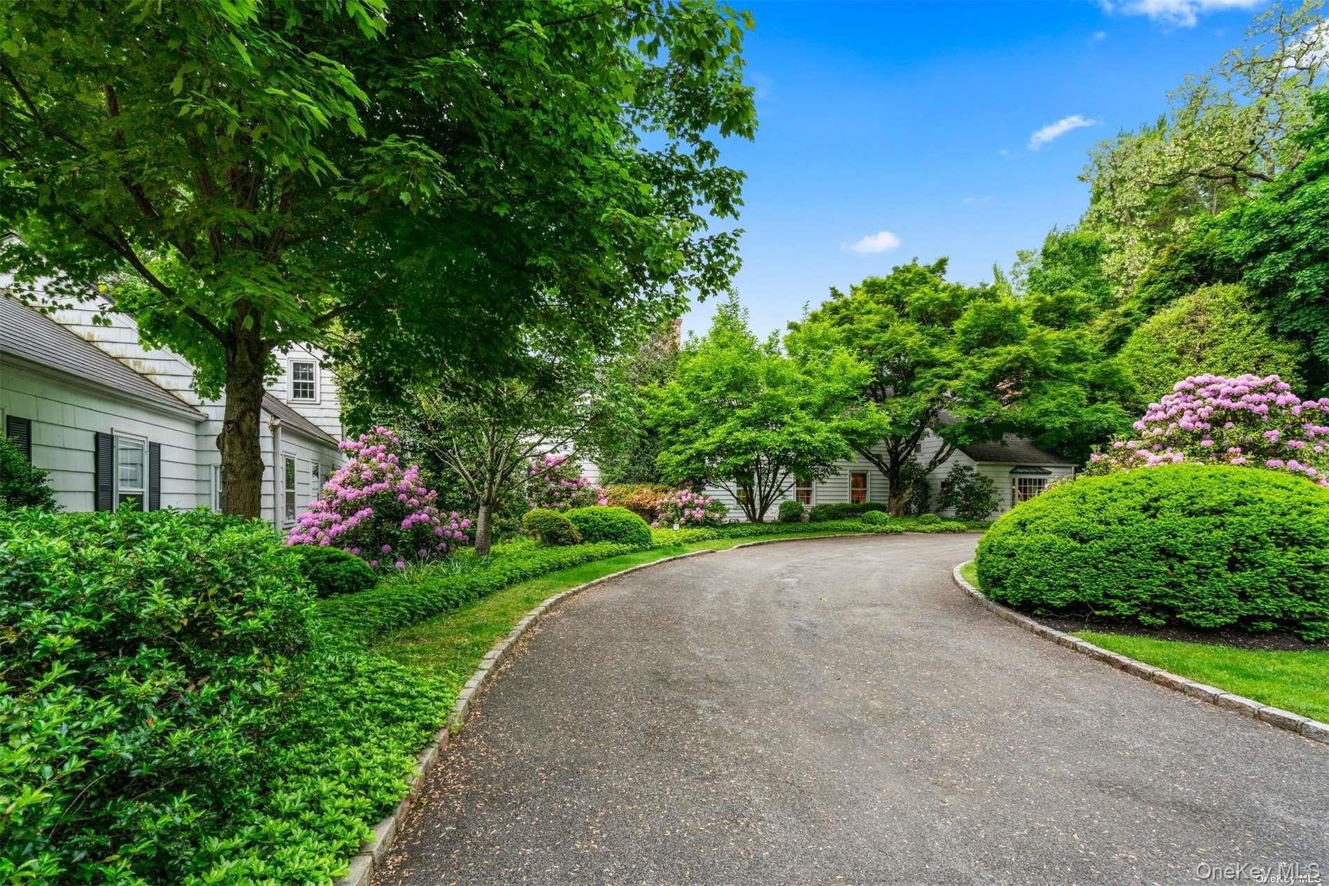 200 Cleft Road Mill Neck, NY 11765 - Photo 2 of 36 Front Exterior with Flowering Shrubs at Entrance