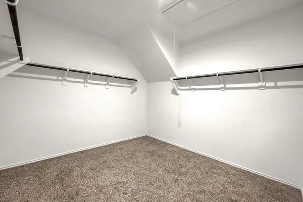 a view of a room with racks on the wall