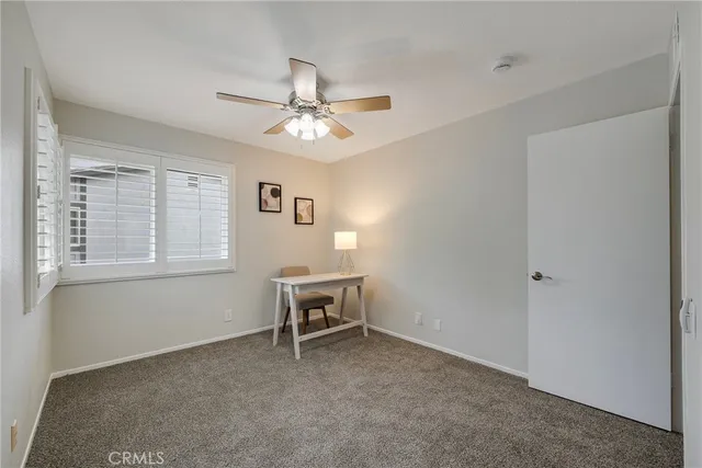 a bathroom with a sink mirror and vanity