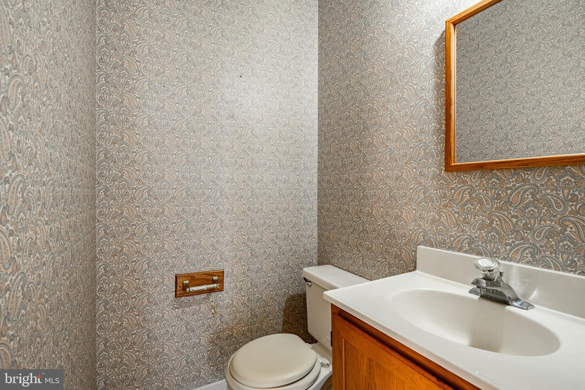 421 East Eagle Road Havertown, PA 19083 - Photo 15 of 49 a bathroom with a sink toilet and mirror
