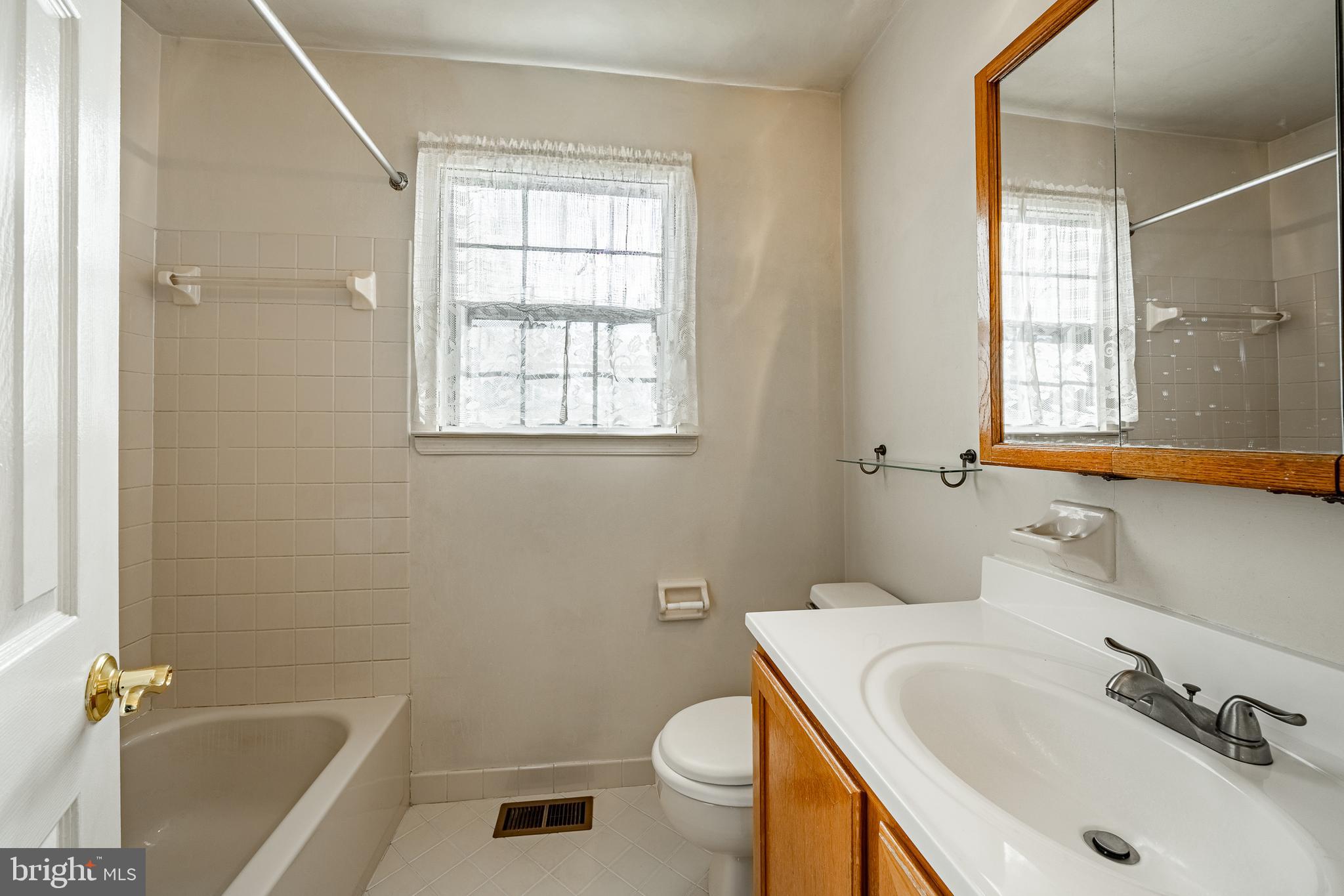 421 East Eagle Road Havertown, PA 19083 - Photo 30 of 49 a bathroom with a sink toilet and shower