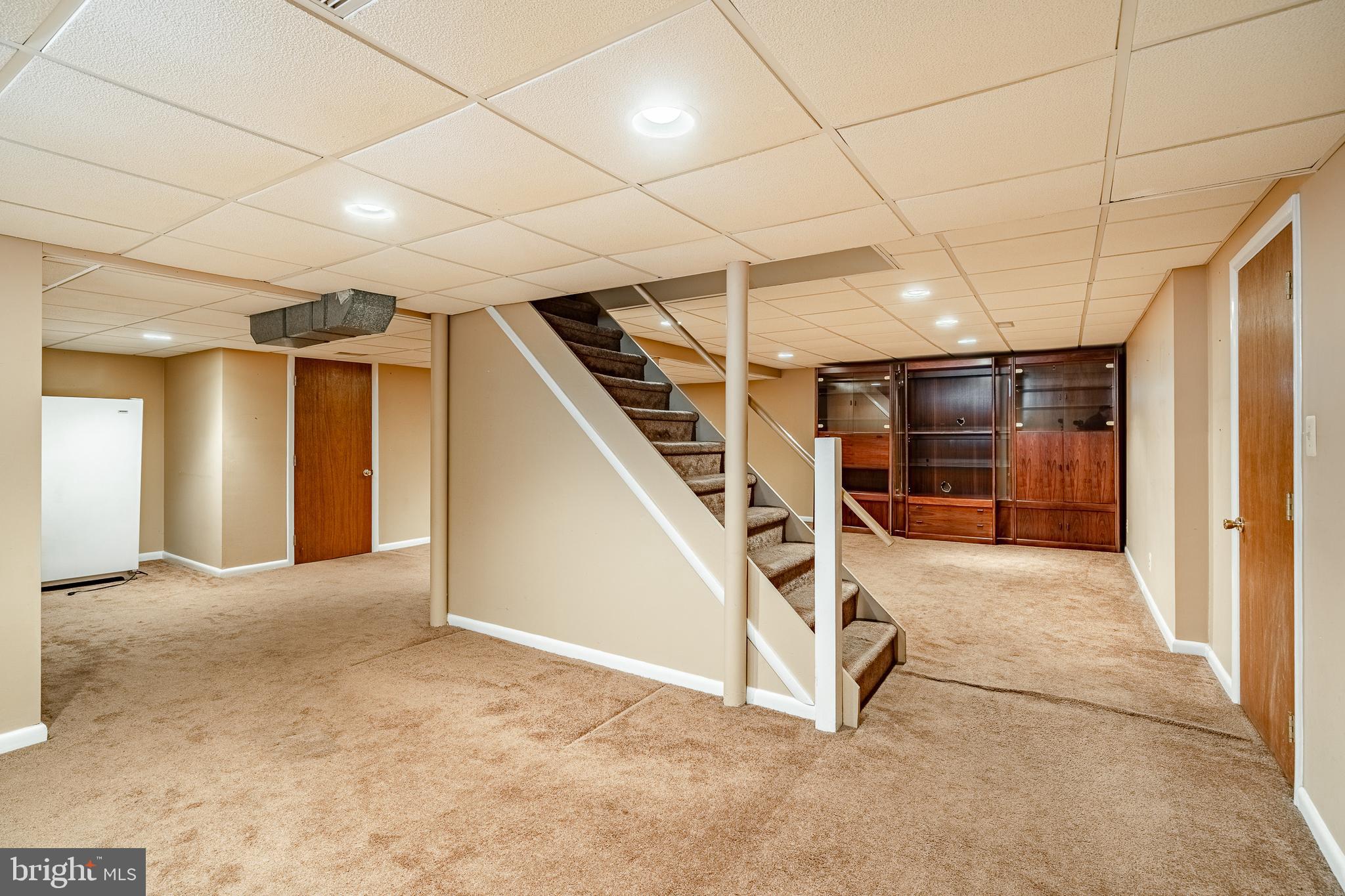 421 East Eagle Road Havertown, PA 19083 - Photo 36 of 49 a view of an empty room with stairs