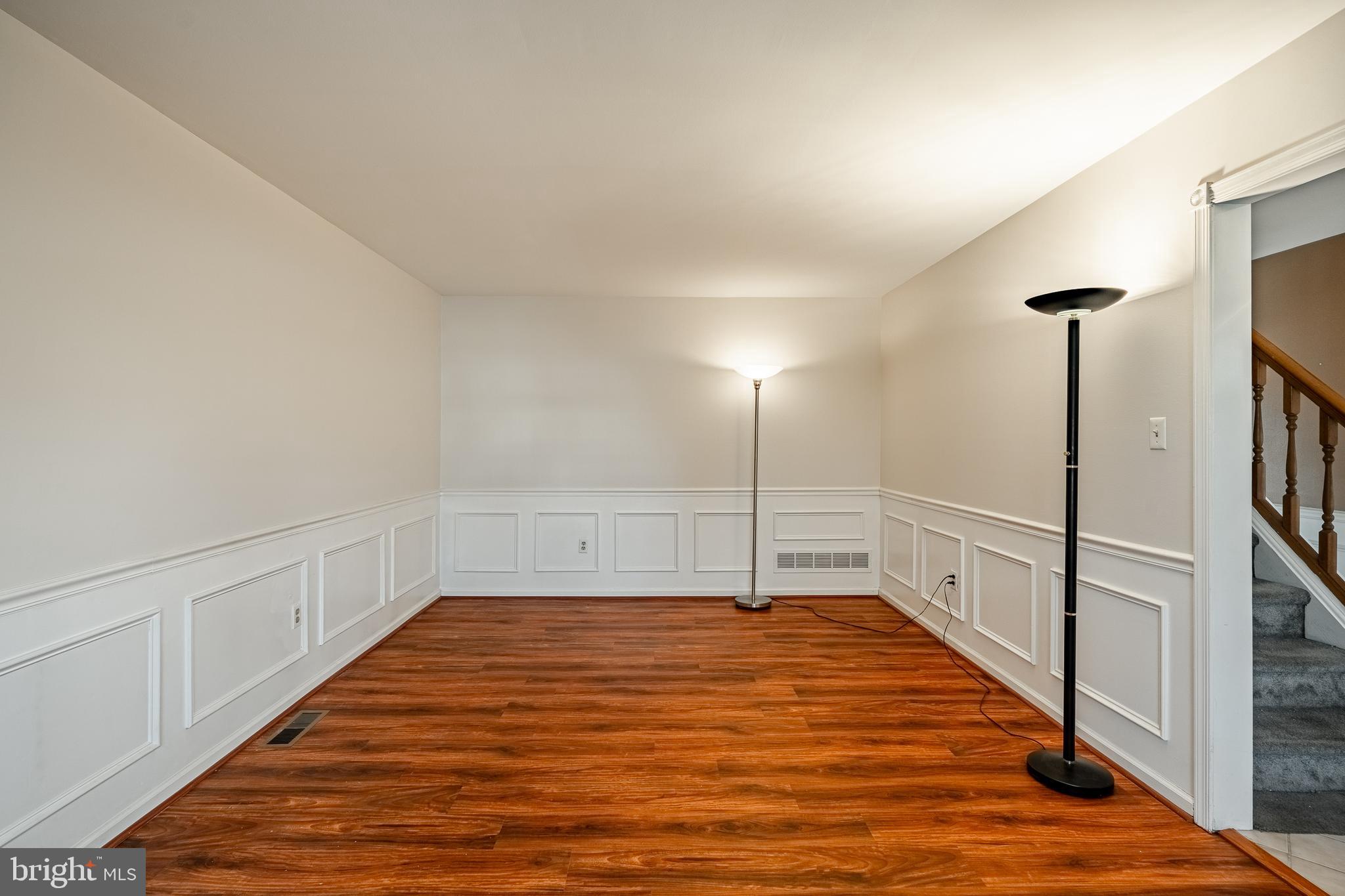 421 East Eagle Road Havertown, PA 19083 - Photo 4 of 49 a view of a room with wooden floor and white walls