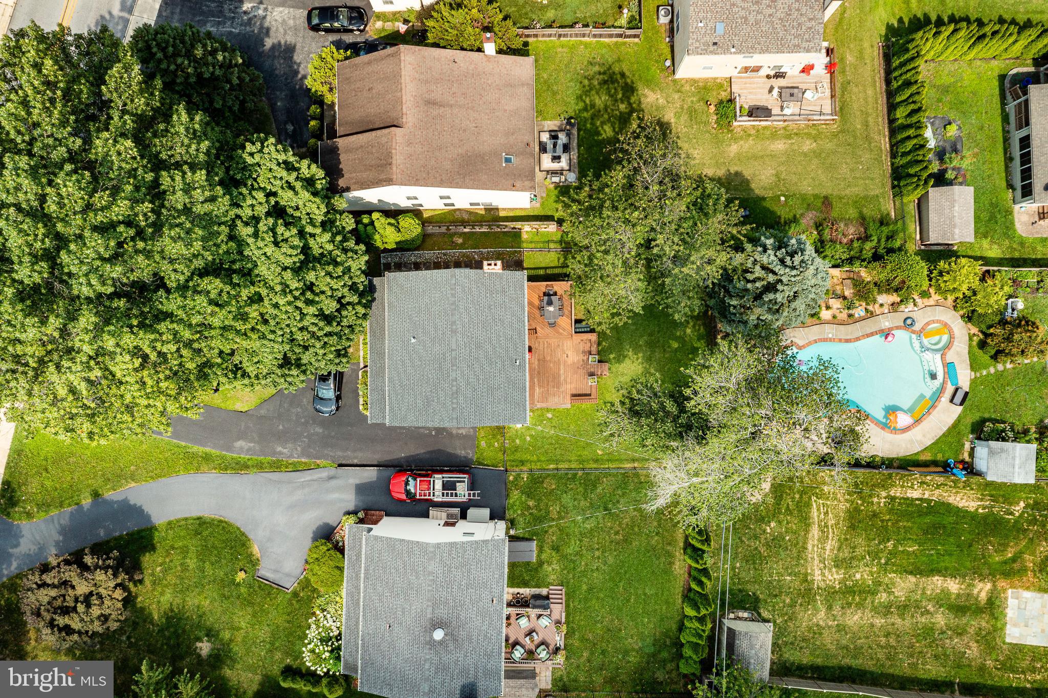421 East Eagle Road Havertown, PA 19083 - Photo 45 of 49 an aerial view of a house with swimming pool and garden