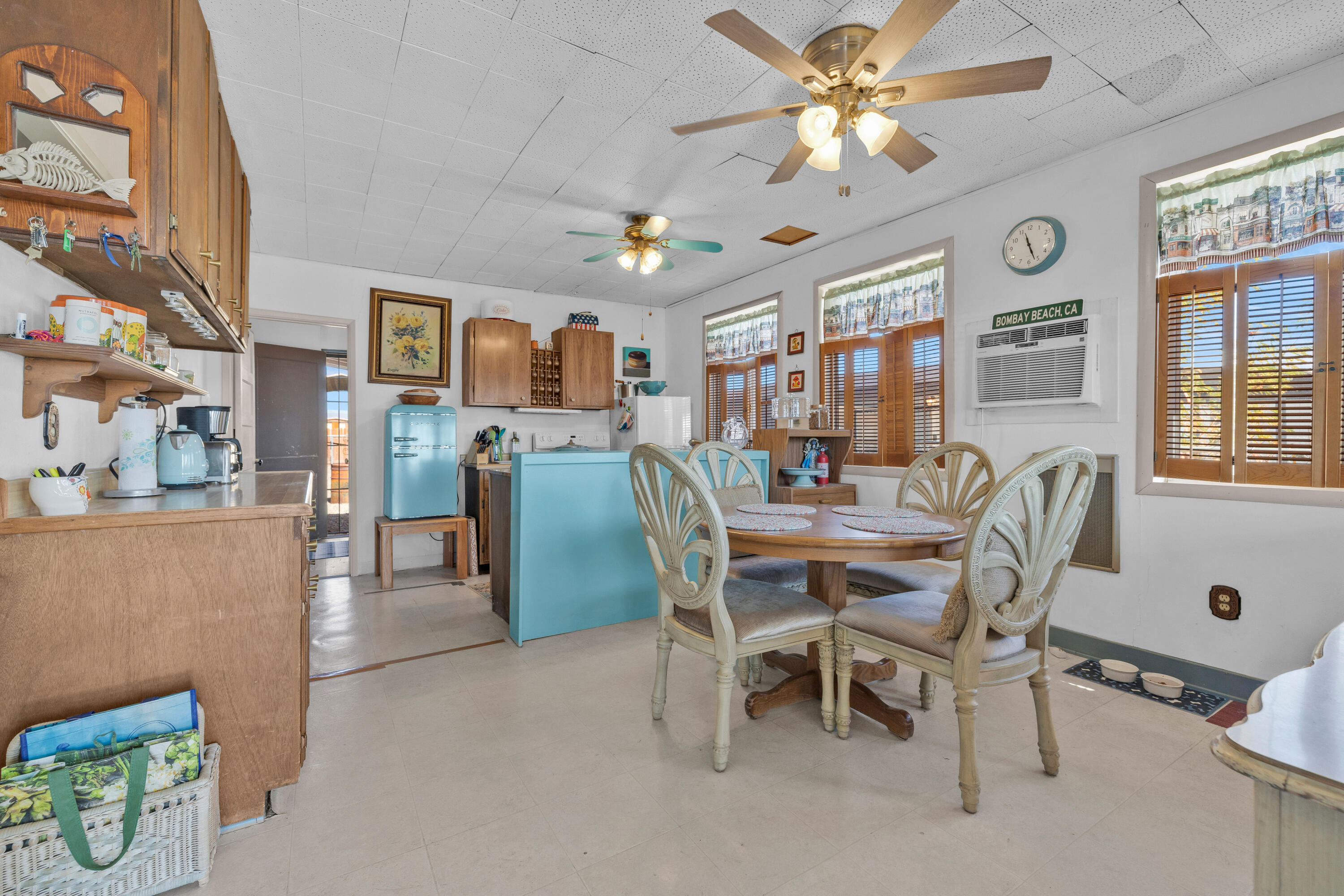 2180 3rd Street Bombay Beach, CA 92257 - Photo 2 of 4 a dining room with furniture and window