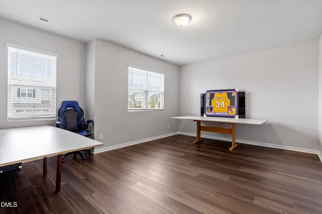 a view of a house with swimming pool