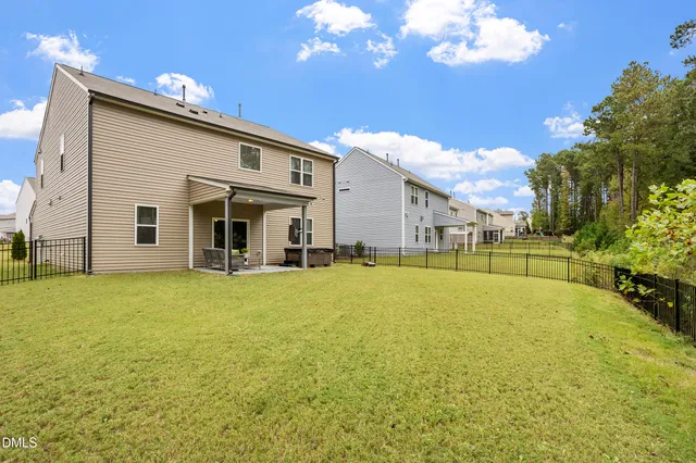 a view of a house with a swimming pool