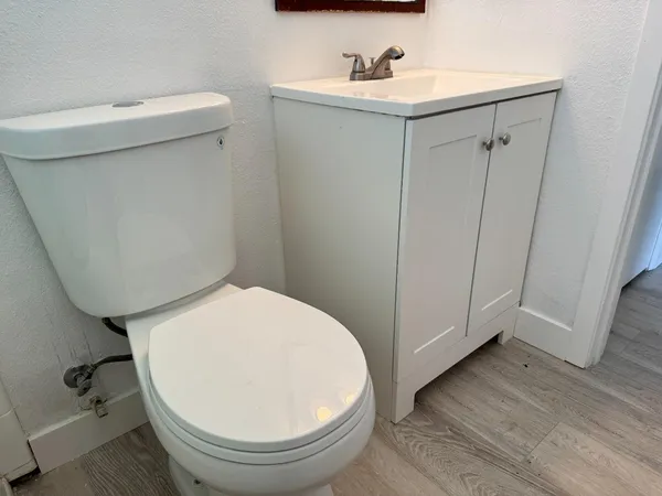 a bathroom with a sink and a toilet
